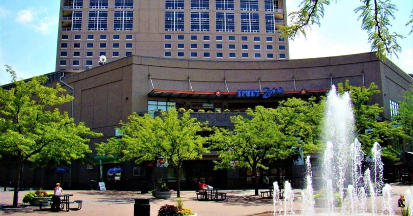 The Grove Hotel rises above a hockey arena and a spacious plaza in the heart of Boise.